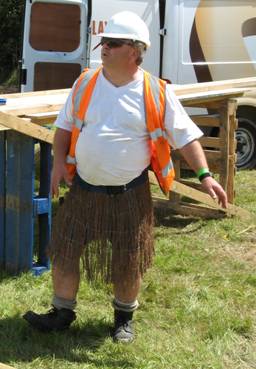 The roof fit perfectly and Carl let out a sigh of relief and did a little dance in thatched roof builders costume.